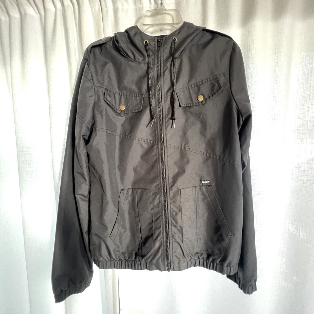 Volcom ladies hooded, lightweight black jacket.